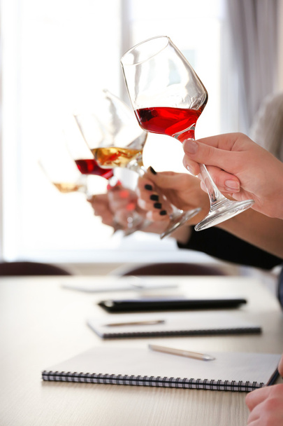 Experts tasting new sorts of wine   - Фото, изображение