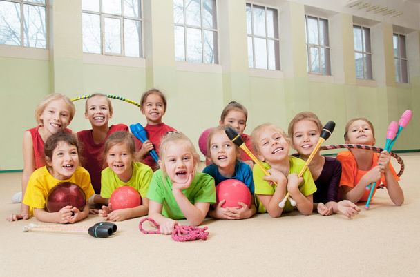 Happy active children in gym - Фото, изображение