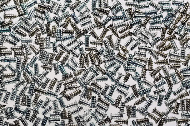 Background of self-tapping screws used for personal computer case - Fotografie, Obrázek