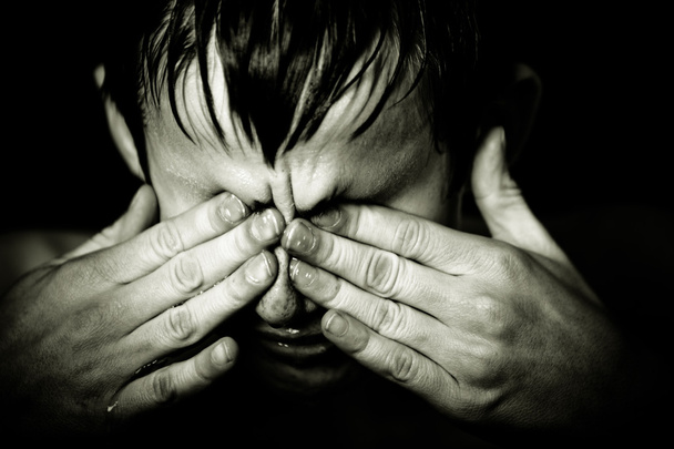 Black and white image of boy rubbing his eyes - Photo, Image