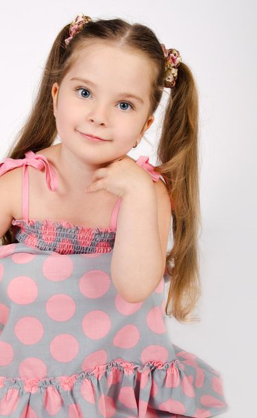 Portrait of cute smiling little girl in dress - Фото, изображение
