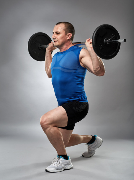 Man doing lunges  - Foto, afbeelding