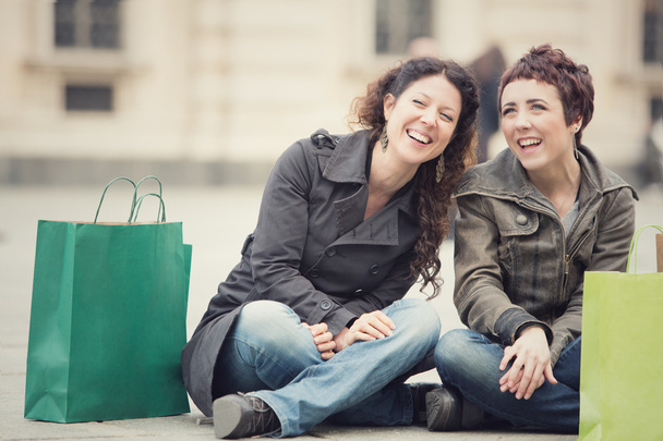 smiling happy women shop together in cityscape - Fotoğraf, Görsel