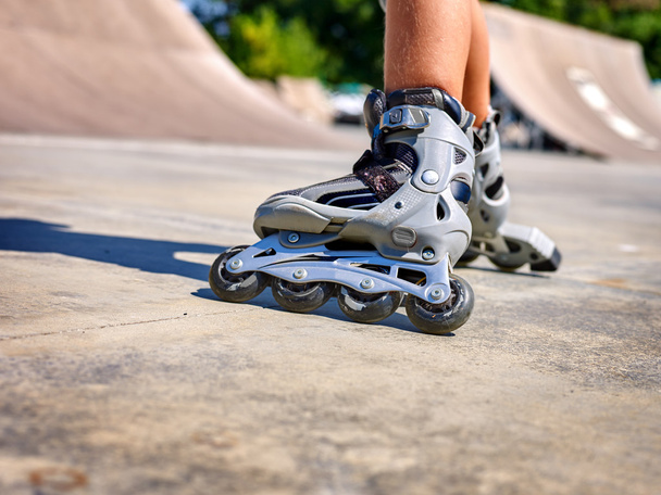 Girl riding on roller skates . - Foto, Imagem