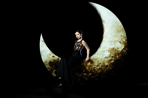 Woman in dress on moon - Фото, изображение