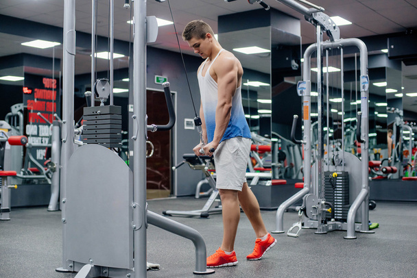 man doing exercises in gym - Photo, Image