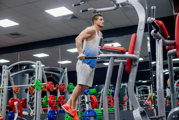 man doing exercises in gym - Photo, Image