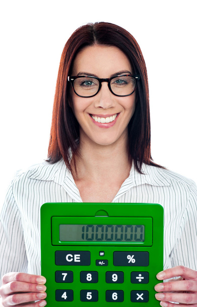 Smiling corporate lady showing green calculator - Photo, Image