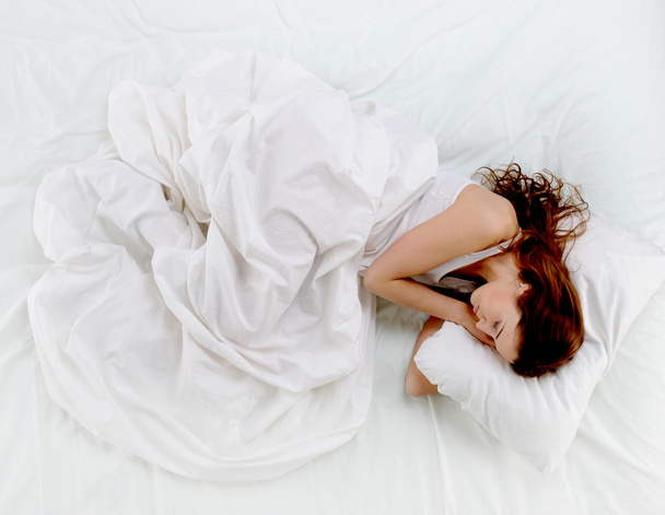Woman sleeping on the bed - Zdjęcie, obraz