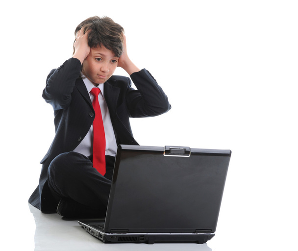 Boy in business suit sitting in front of computer - Foto, Imagen
