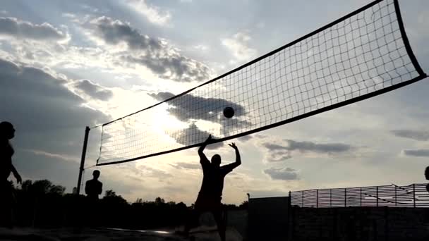 Voleibol de praia profissional ao pôr do sol em câmera lenta
. - Filmagem, Vídeo