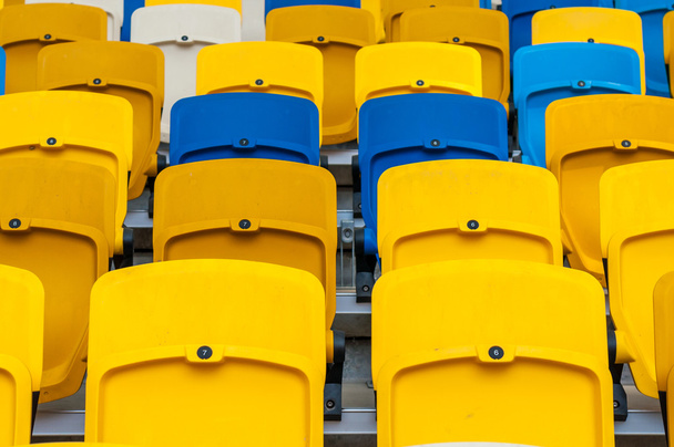 Empty plastic seats in a footbal or soccer stadium. 2016 sport background - Photo, image