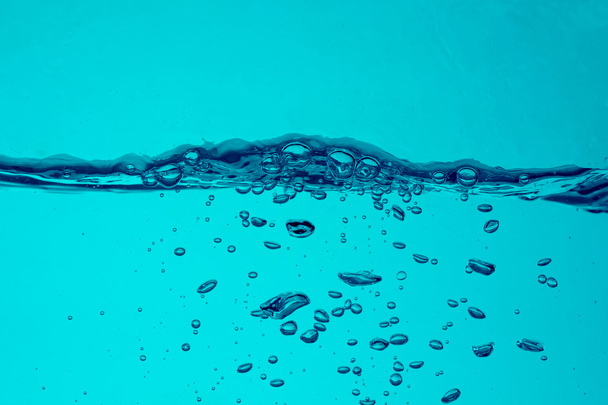 Burbujas de fondo de agua azul
 - Foto, Imagen