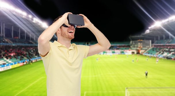 man in virtual reality headset over football field - Foto, immagini
