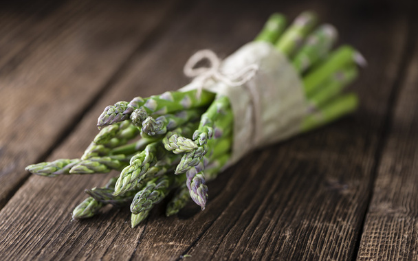 Green Asparagus on wood - Photo, image