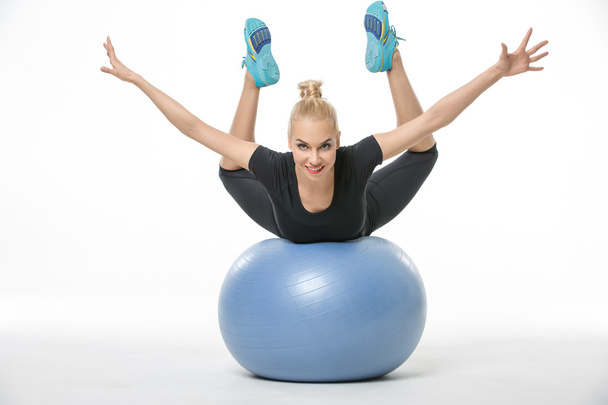 Sportive blonde lies on fitball - Foto, Imagem