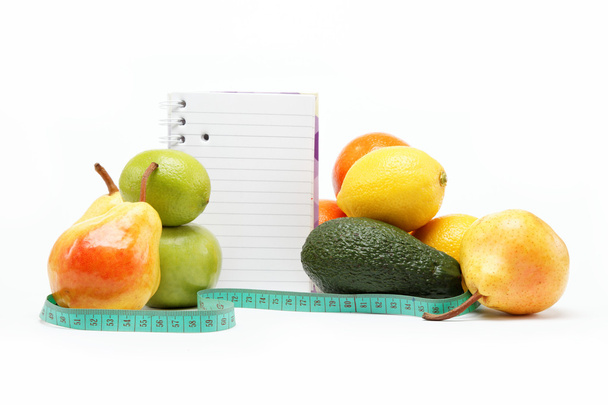 Natural products. Diet. Fresh fruit on a white background. - 写真・画像