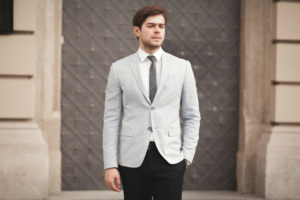Handsome stylish young businessman posing portrait outdoor - Foto, Imagen