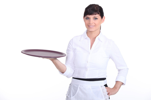 σερβιτόρα με ένα κενό δίσκο - Φωτογραφία, εικόνα