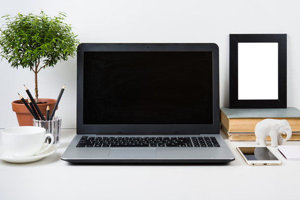 modern work space with laptop mockup on a table - Photo, Image
