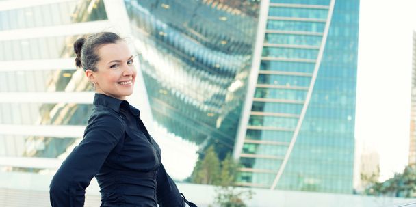 smiling businesswoman outdoors - Фото, зображення