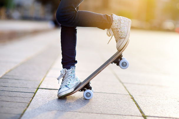 Closeup of skateboarder legs - Фото, изображение