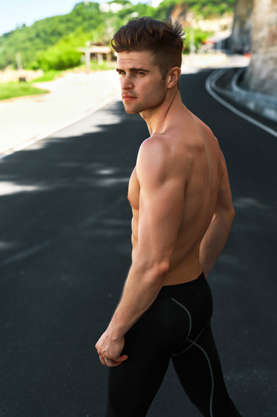 Handsome Sexy Fitness Man With Muscular Body Outdoors In Summer. - Photo, image