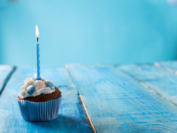 birthday cupcake over blue background - Photo, Image