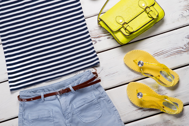 Sailor suit, shorts, sandals and handbag. - Photo, Image