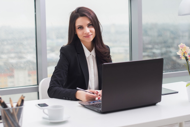Business woman with notebook in office, workplace - Фото, зображення