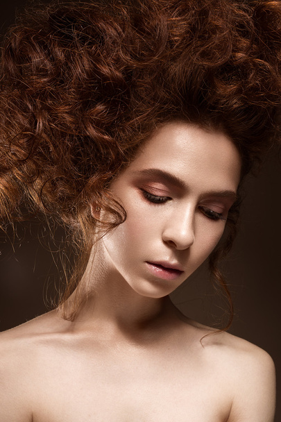 Beautiful redhead girl with curls and classic make-up. Beauty face - Foto, Imagem