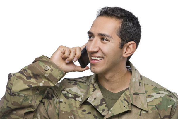 wojskowy Latino z cellphone - Zdjęcie, obraz