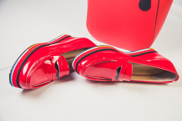 red shoes, stylish patent leather shoes - Fotó, kép