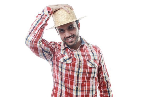 Portrait of brazilian man wearing typical clothes for the Festa  - Foto, Imagen