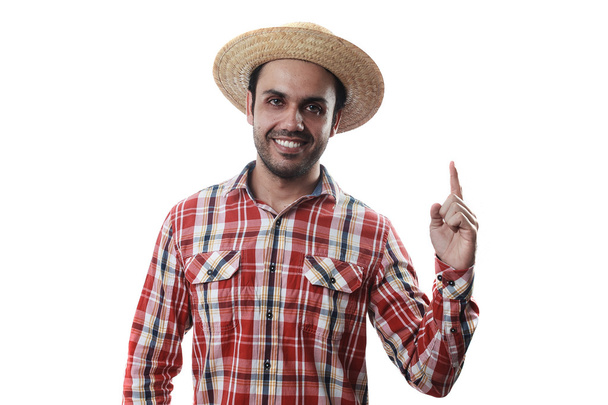Portrait of brazilian man wearing typical clothes for the Festa  - Foto, Imagen