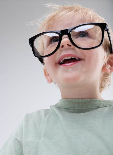 portrait of a little child with BIG eyeglasses - Foto, Imagen