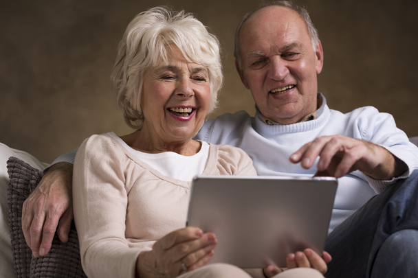 Older couple and new technology - Фото, изображение