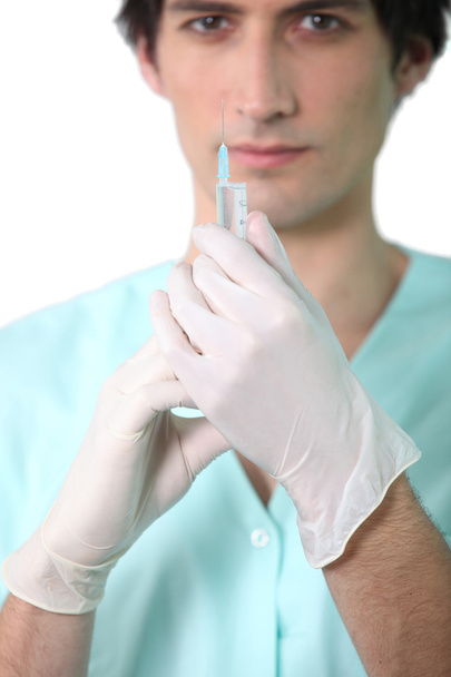 Nurse holding injection - Valokuva, kuva