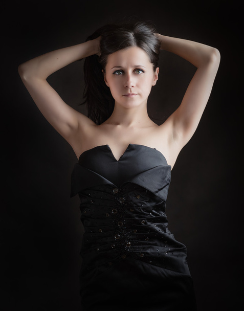 Woman in black dress. - Foto, Bild