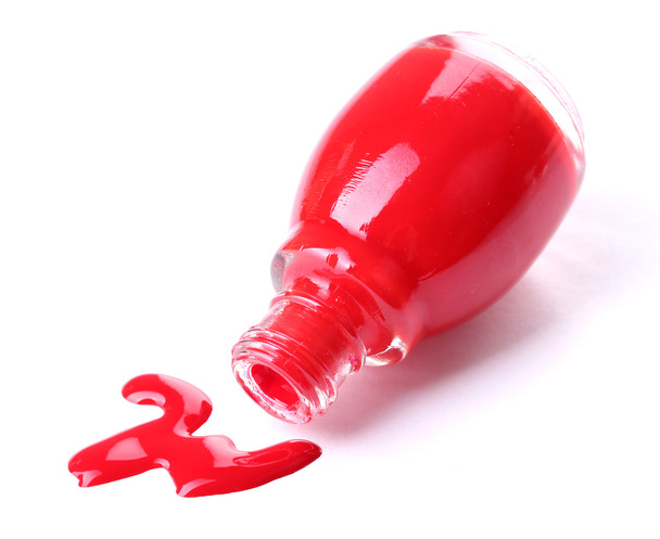 Red nail polish isolated on white - 写真・画像
