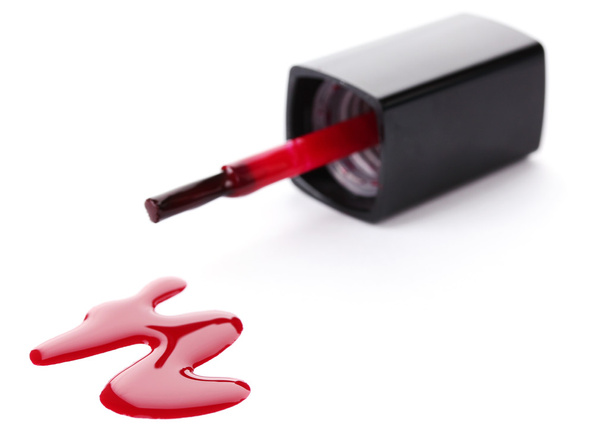 Red nail polish and brush isolated on white - Fotó, kép