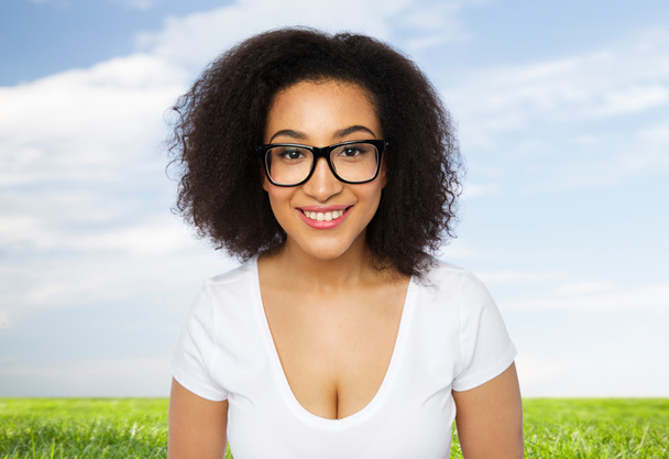 happy african woman or student girl in eyeglasses - Photo, Image