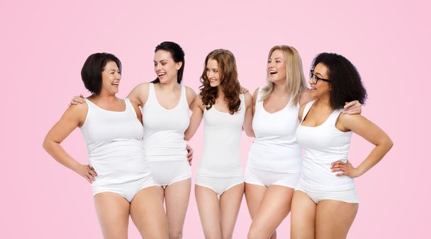 group of happy different women in white underwear - Foto, Imagen