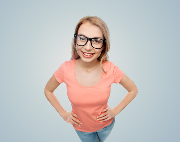 happy young woman or teenage girl in eyeglasses - Zdjęcie, obraz