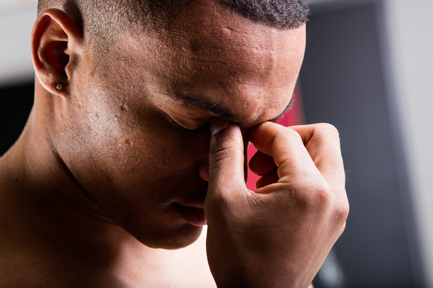 closeup portrait of a man with an headache - Photo, Image