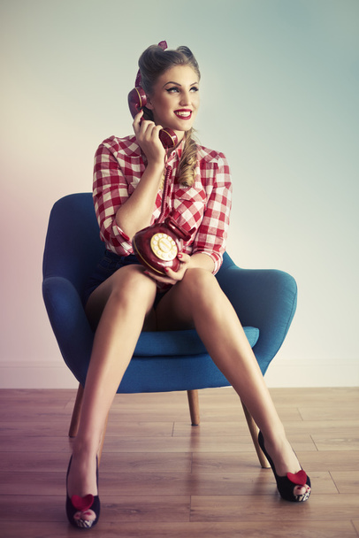 Pin up girl talking on the phone  - Photo, Image