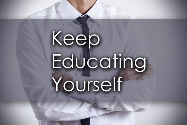 Keep Educating Yourself (KEY) - Young businessman with text - bu - Photo, Image