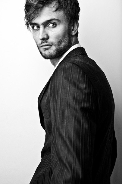Elegant stylish handsome man. Black-white studio fashion portrait.  - Zdjęcie, obraz