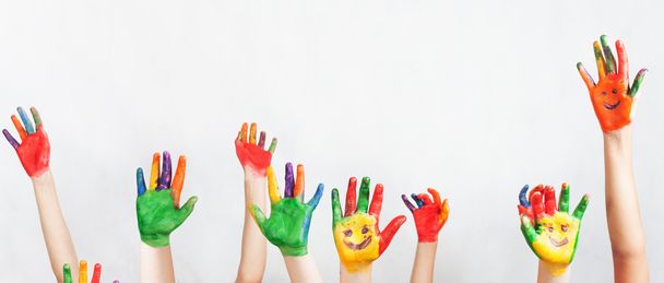 Lot of painted hands raised up, Children's Day - Photo, image