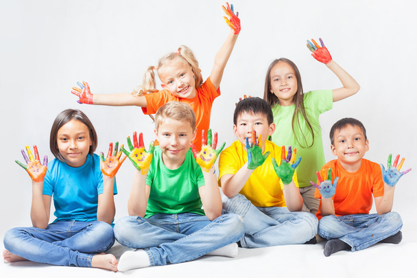 Happy kids with painted hands smiling - Foto, Bild